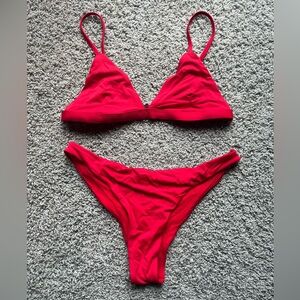 Brand: Full Tilt - size small bikini.  Triangle top and minimal coverage bottoms